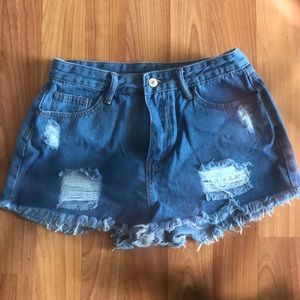 Brand New! Never worn dark denim shorts. Size women medium.